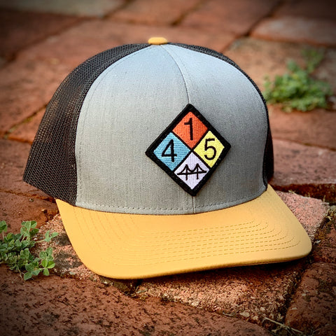 Curved-Brim Trucker (Stone/Clay/Charcoal) with 415 Patch