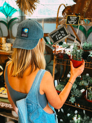 tommy breeze Full moon patch dad hat in a plant store