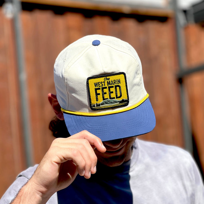 Guest wearing a custom patch trucker hat
