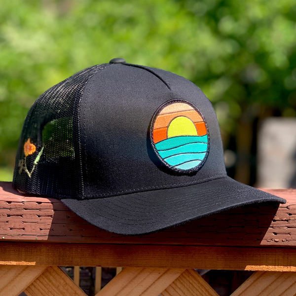 Poppy Serenity Curved-Brim Trucker (Black)